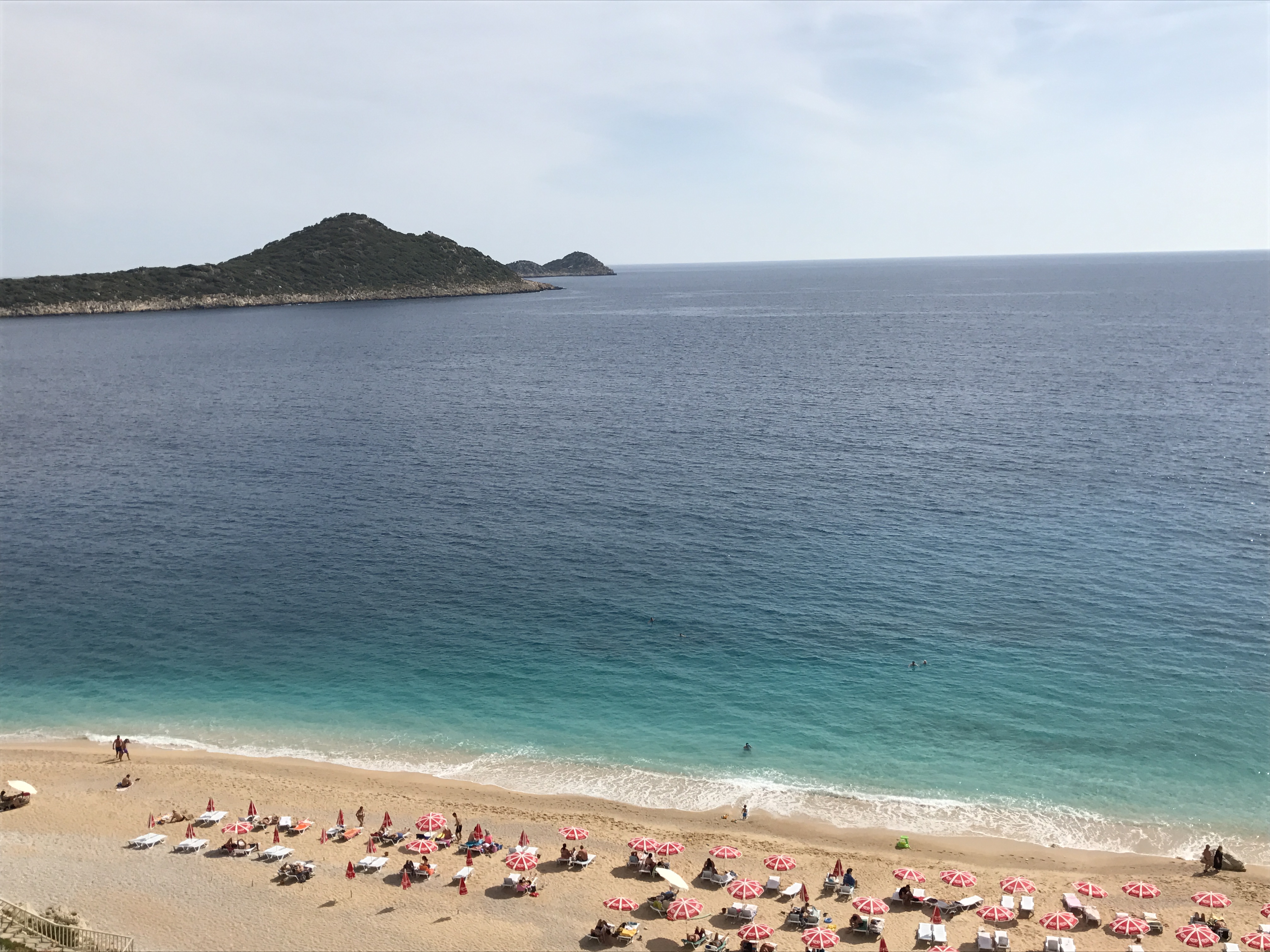 Turquoise Water Beach in Antalya with colorful umbrellas